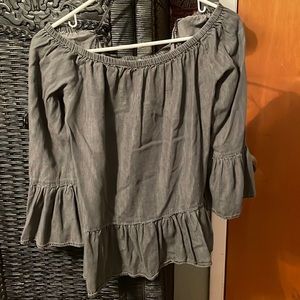 Off the shoulder, ruffled shirt.